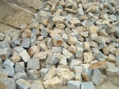 Regulační obkladový průměrné tl. cca 20cm-opěrné zídky,dlažby 